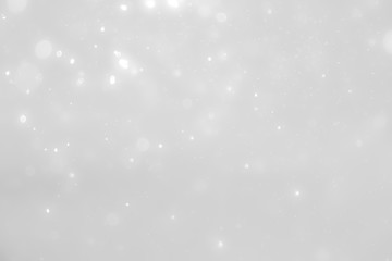 White and Silver lights on bokeh abstract background.