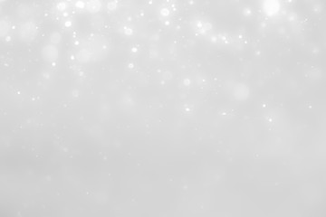 White and Silver lights on bokeh abstract background.