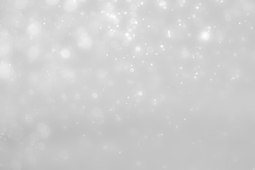 White and Silver lights on bokeh abstract background.