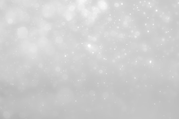 White and Silver lights on bokeh abstract background.