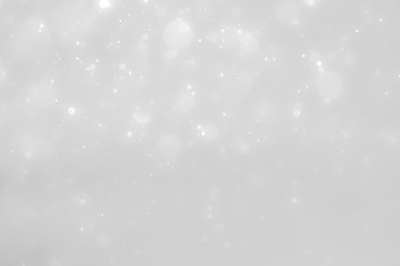 White and Silver lights on bokeh abstract background.