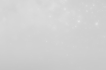 White and Silver lights on bokeh abstract background.