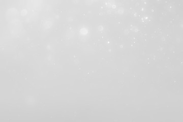 White and Silver lights on bokeh abstract background.