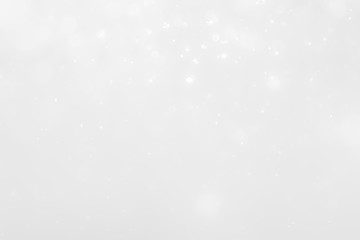 White and Silver lights on bokeh abstract background.