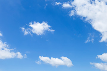 Obraz premium Spring and Summer blue sky background, white cloud over clear blue sky, season and weather concept backgroun