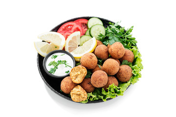 Fresh vegetarian falafel with tzatziki sauce and fresh vegetables. isolated on white background.