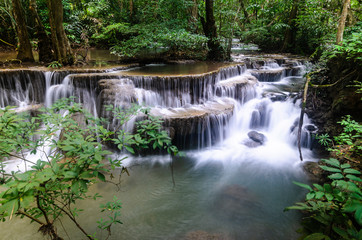 Naklejka na ściany i meble Huai Mae Kamin Waterfall in the rainy season at the tropical forest of Kanchanaburi National Park, Thailand