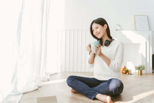 Portrait Asian Woman Relaxing With Coffee At Home