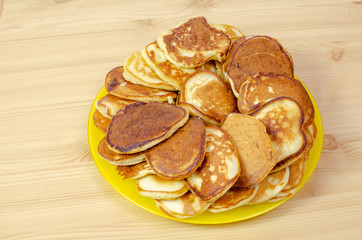 fried pancakes on a round platter