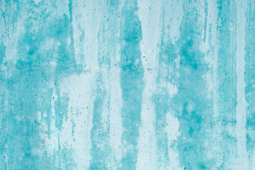Abstract turquoise watercolor pattern. Drips of green paint stains on the wall. Green spots of paint on canvas surface. Painted dirty wall in gradient, aquarelle. Light, bright, soft illustration.
