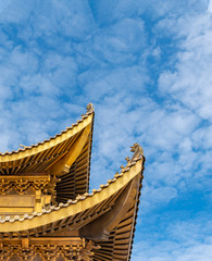 Fototapeta na wymiar The cornice of the golden temple, the golden roof of Emei mountain in Sichuan province, China