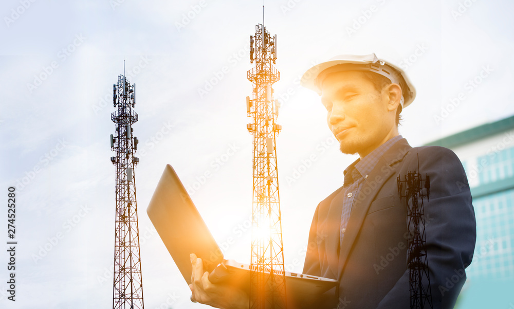Aufkleber engineer holding computer notebook for work and sky technology background