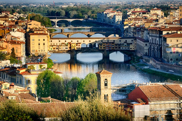 Fototapeta na wymiar Panorama of Florence with Ponte Vecchio (Old Florence Bridge) on river Arno from Piazzale Michelangelo in Florence, Tuscany, Italy. April 2012