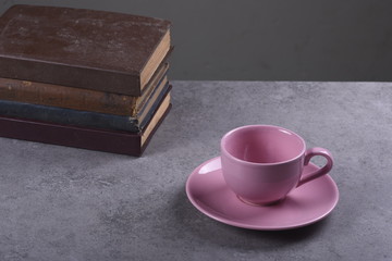 Old Book and Coffee on Stone Background