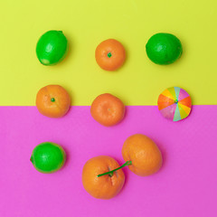 Tangerines and lime mix. Minimal flat lay art