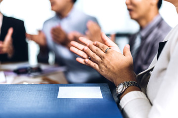 Business people clapping hands in the meeting.Partnership approval and thanks gesture concept