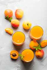 Fresh apricot juice on the marble table