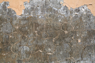 Texture old cracked painted plaster.