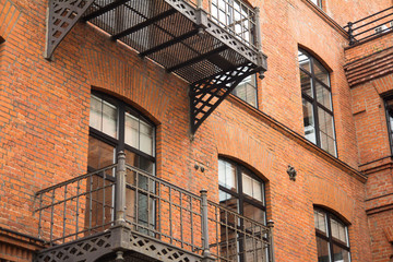 Old brick building with balconies