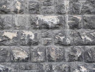 Solid stone blocks wall background. Clear copy space backdrop wall grunge vintage texture. Abstract weathered stained retro old anicent wall.