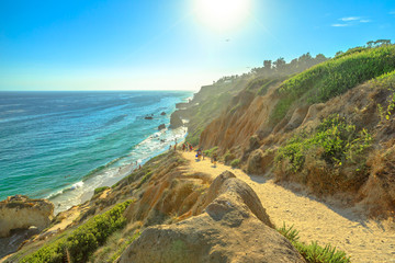 Panoramic view from coastal walk leading down to El Matador State Beach at sunlight. Pacific coast...