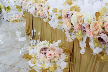 Wedding flower decoration with candels on the floor