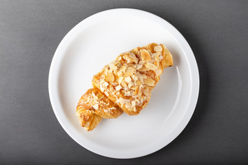 freshly baked croissants on a plate.