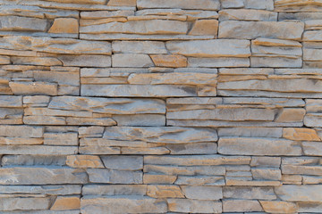 The texture of the wall of a variety of colored stones