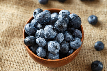 Fresh Blueberries in  Bowl. Healthy diet vegetarian food. Top view.