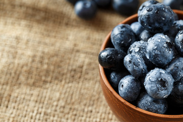 Fresh Blueberries in  Bowl. Healthy diet vegetarian food. Top view.