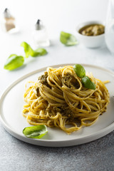 Homemade pasta with pesto sauce
