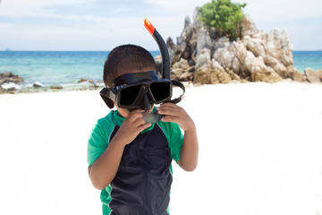  Children wear clear diving suits for sea travel.