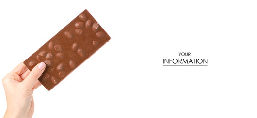 A bar of chocolate with almonds in hand on a white background isolation