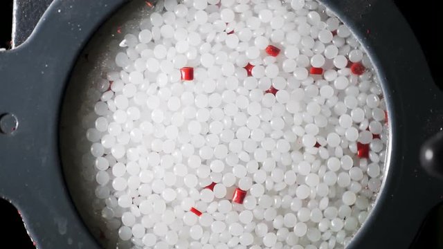 Plastic granules on extruder for making plastics on extrusion manufactory