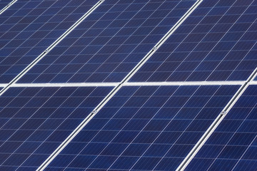 Closeup mounted solar panels of power plant