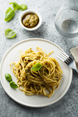 Homemade pasta with pesto sauce