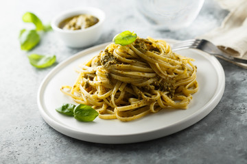Homemade pasta with pesto sauce