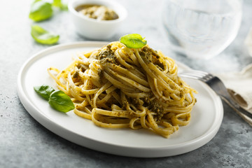 Homemade pasta with pesto sauce