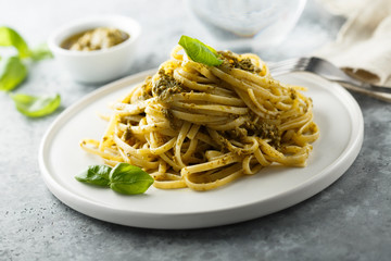 Homemade pasta with pesto sauce