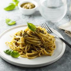 Homemade pasta with pesto sauce