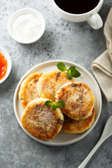 Homemade cottage cheese pancakes on white plate