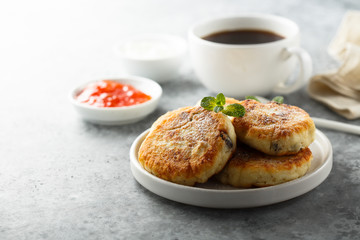 Homemade cottage cheese pancakes on white plate
