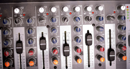 Close-up of modern digital sound mixer in a sound recording studio