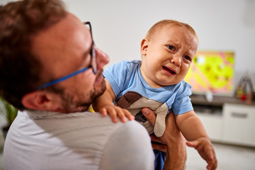 Single dad going nuts at home with a baby.