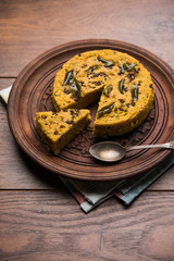 Handvo/handwa is a vegetable cake originating from the Gujarat, India. selective focus