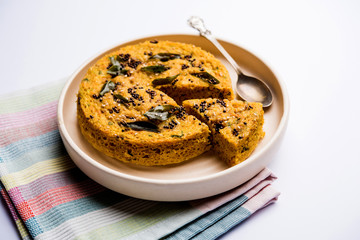 Handvo/handwa is a vegetable cake originating from the Gujarat, India. selective focus