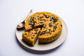 Handvo/handwa is a vegetable cake originating from the Gujarat, India. selective focus