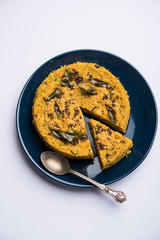 Handvo/handwa is a vegetable cake originating from the Gujarat, India. selective focus