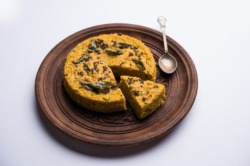 Handvo/handwa is a vegetable cake originating from the Gujarat, India. selective focus