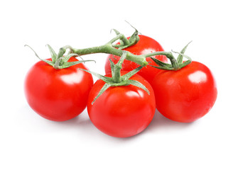 Branch of fresh cherry tomatoes isolated on white